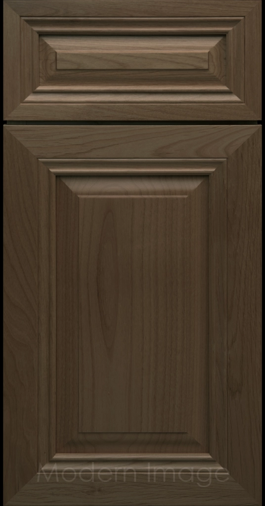 Close-up of a Beachwood-stained wood cabinet door with a mitered frame and traditional Cambridge raised center panel.